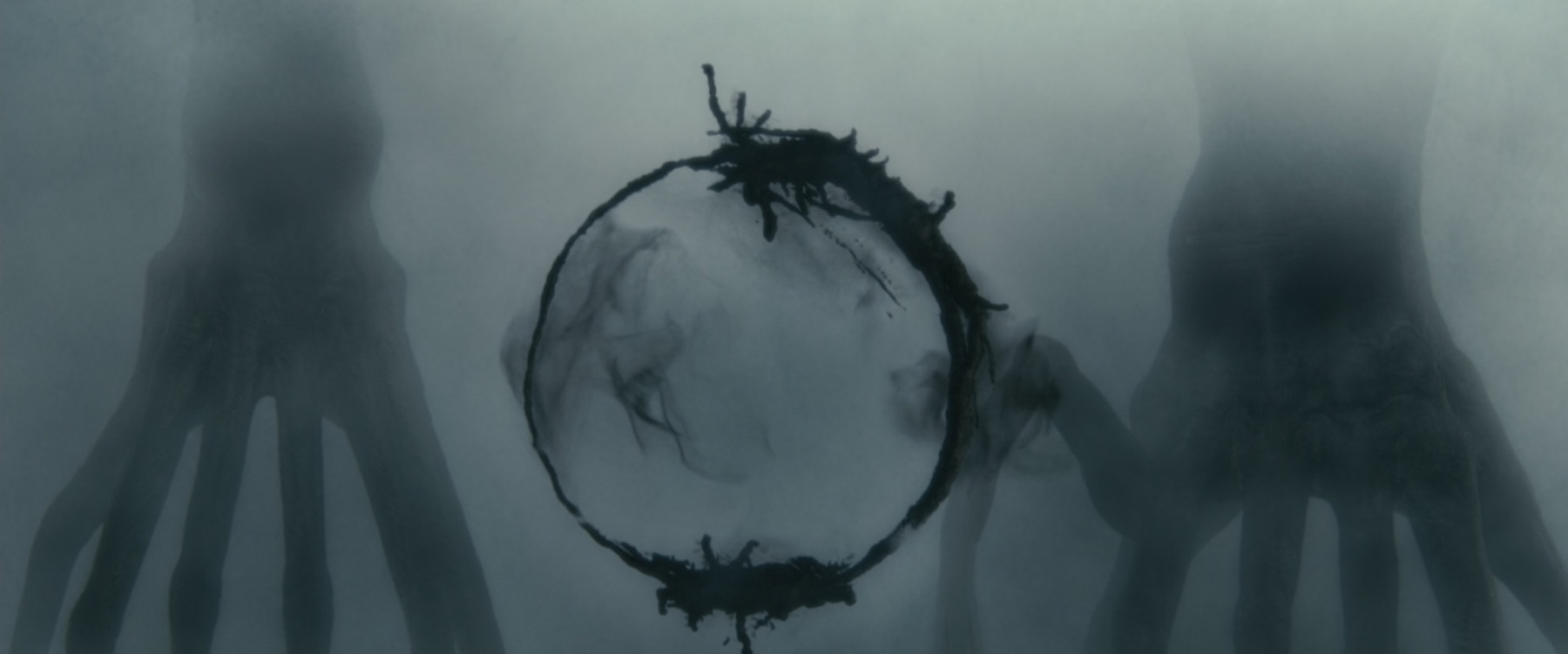 Heptapod ink — a logogram forming on the glass, meaning compressed into a single gesture